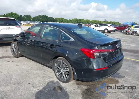 2024 Honda Civic Touring z USA, uszkodzony, nr VIN 2HGFE1F92RH318686